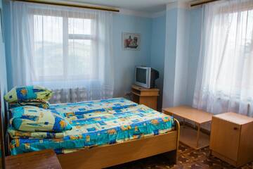 Фото номера Стандартный двухместный номер с 2 отдельными кроватями Отель Эдельвейс г. Verkhne-Studeny 5